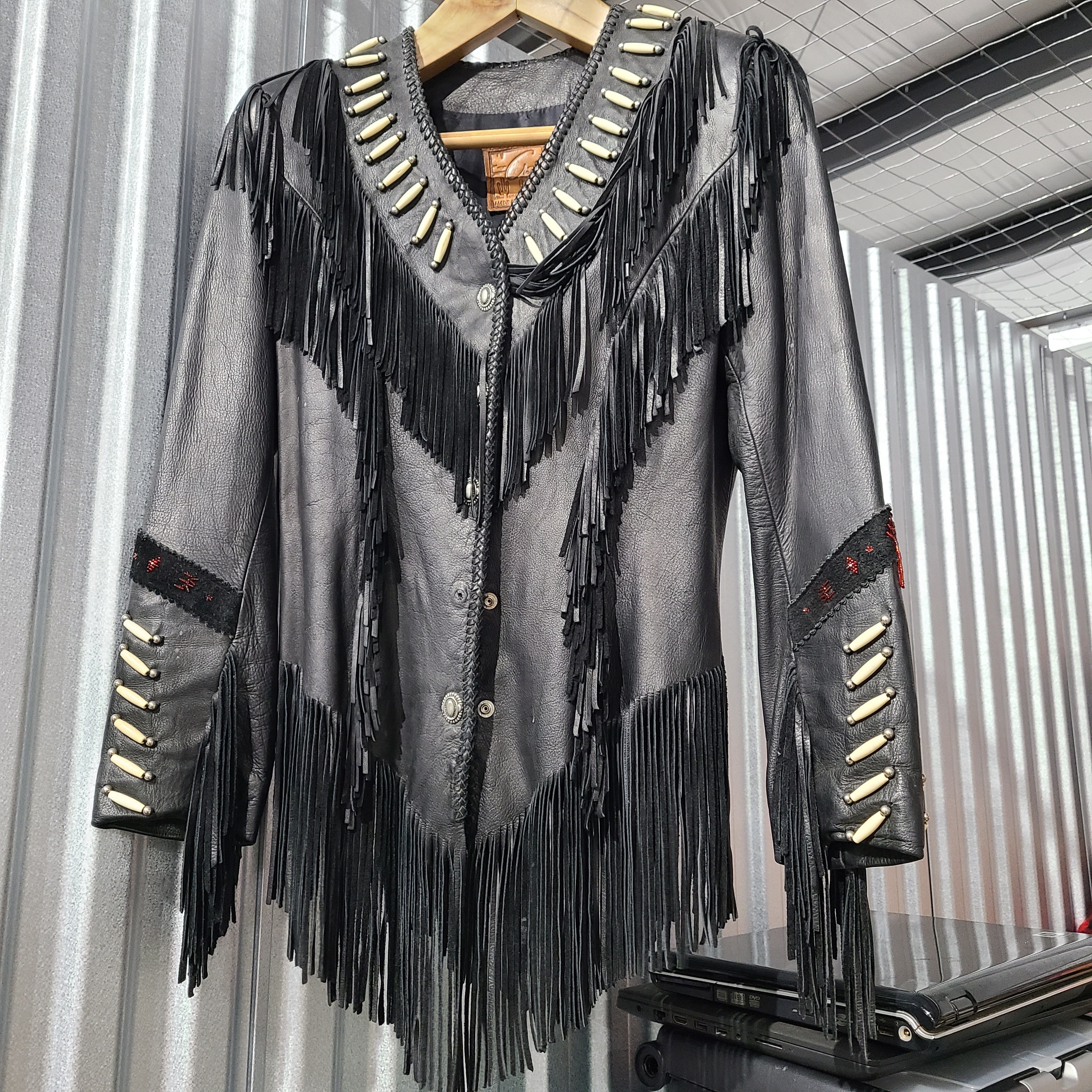 Lovely black fringe leather jacket