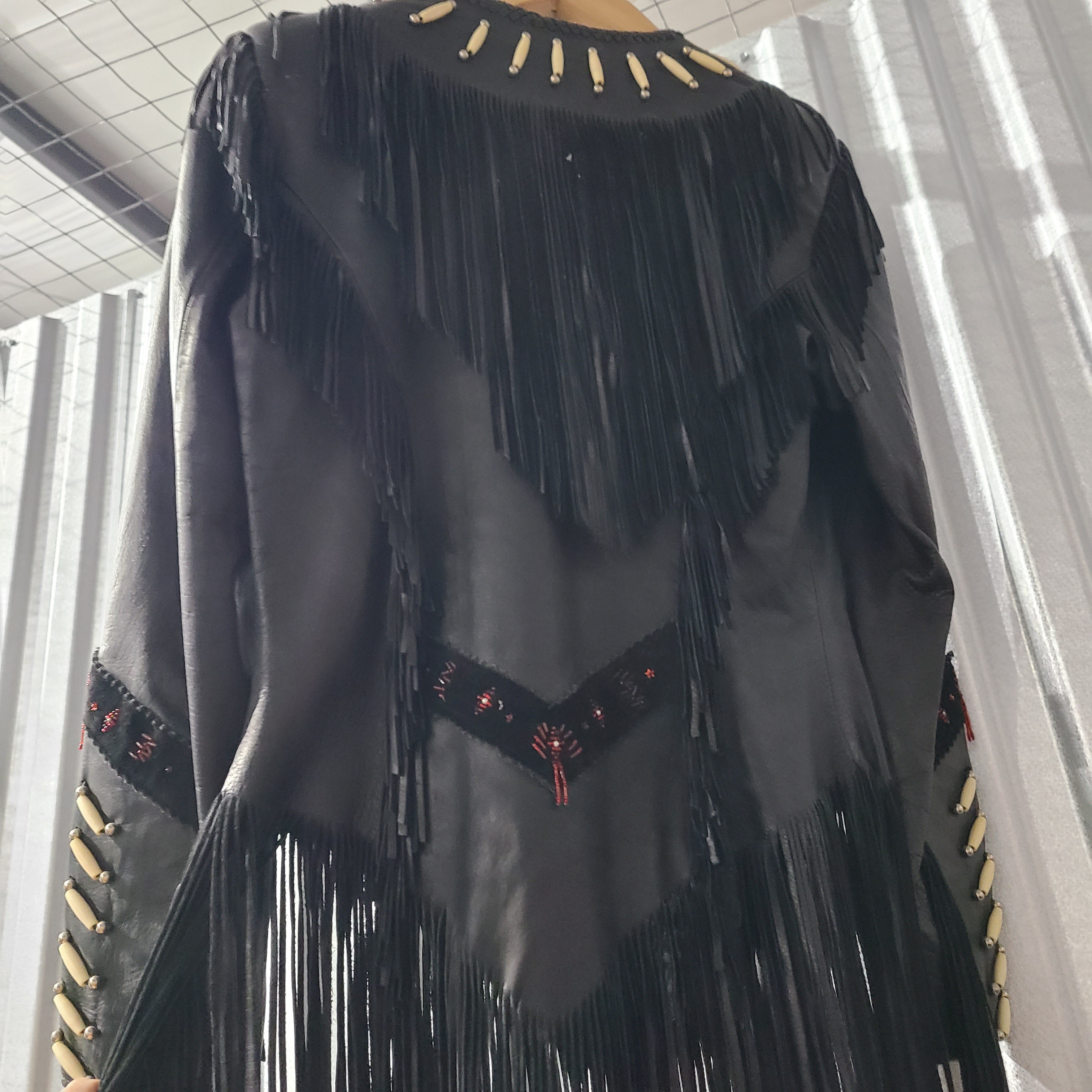 Lovely black fringe leather jacket